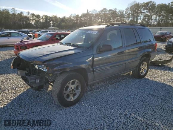 2001 Jeep Grand Cherokee Laredo z VIN 1J4GW48S91C578800, wystawiony jako Copart lot #87934695 z przebiegiem 250 784 mil mil oraz Szkoda całkowita • Salvage title. Historia ofert i sprzedaży dostępna na DreamBid. Obrazek 1.