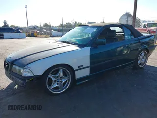 1997 BMW 3-Series 328IC with VIN WBABK8323VET99072, listed as a IAAI auction lot 40669447 with 135,584 mi miles. Bid and sale history available at carsss.com. Image 19.