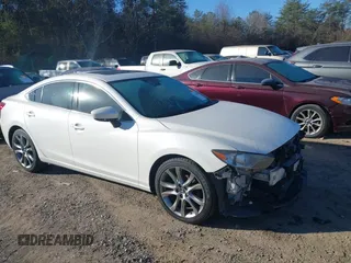 2015 Mazda 6 i Grand Touring with VIN JM1GJ1W56F1221951, listed as a IAAI auction lot 41661522 with 183,288 mi miles. Bid and sale history available at carsss.com. Image 1.