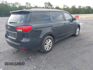 2016 Kia Sedona LX with VIN KNDMB5C16G6188852, listed as a IAAI auction lot 42238208 with 117,045 mi miles and . Bid and sale history available at DreamBid. Image 4.