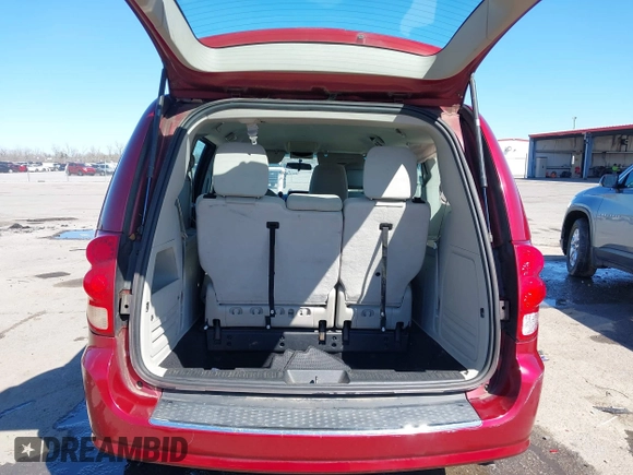 2014 Dodge Grand Caravan American Value with VIN 2C4RDGBG6ER223820, listed as a IAAI auction lot 41705097 with 213,180 mi miles and . Bid and sale history available at DreamBid. Image 8.
