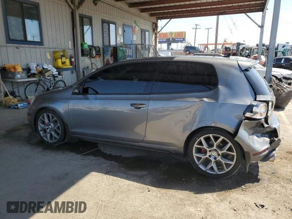 2013 Volkswagen GTI w/Conv & Sunroof z VIN WVWFD7AJ4DW031740, wystawiony jako Copart lot #70099084 z przebiegiem 130 193 mil mil oraz Szkoda całkowita • Salvage title. Historia ofert i sprzedaży dostępna na DreamBid. Obrazek 2.