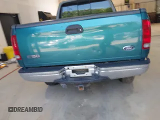 1998 Ford F-150 XL with VIN 1FTRX18L5WNB23716, listed as a IAAI auction lot 42579695 with 305,363 mi miles and . Bid and sale history available at DreamBid. Image 16.