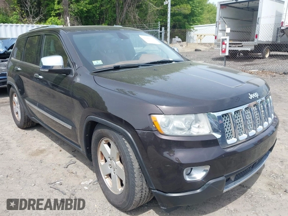 2011 Jeep Grand Cherokee Overland z VIN 1J4RR6GT2BC700758, wystawiony jako IAAI lot #42260235 z przebiegiem 98 609 mil mil oraz . Historia ofert i sprzedaży dostępna na DreamBid. Obrazek 1.