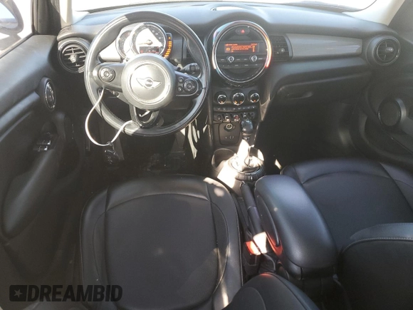 2016 MINI Hardtop 4 Door with VIN WMWXU1C53G2D11582, listed as a Copart auction lot 47461225 with 99,378 mi miles and Salvage Title. Bid and sale history available at DreamBid. Image 8.