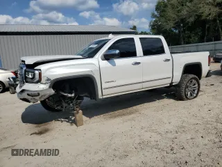 2017 GMC Sierra 1500 Denali z VIN 3GTU2PEJ2HG433669, wystawiony jako Copart lot #57460285 z przebiegiem 131 113 mil mil oraz Szkoda całkowita • Salvage title. Historia ofert i sprzedaży dostępna na DreamBid. Obrazek 1.