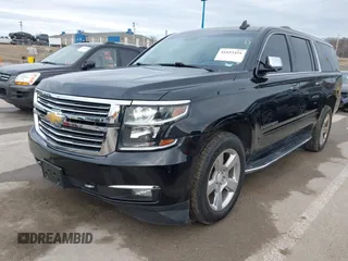 2019 Chevrolet Suburban Premier with VIN 1GNSKJKC7KR261826, listed as a IAAI auction lot 41652451 with 127,032 mi miles and . Bid and sale history available at DreamBid. Image 18.