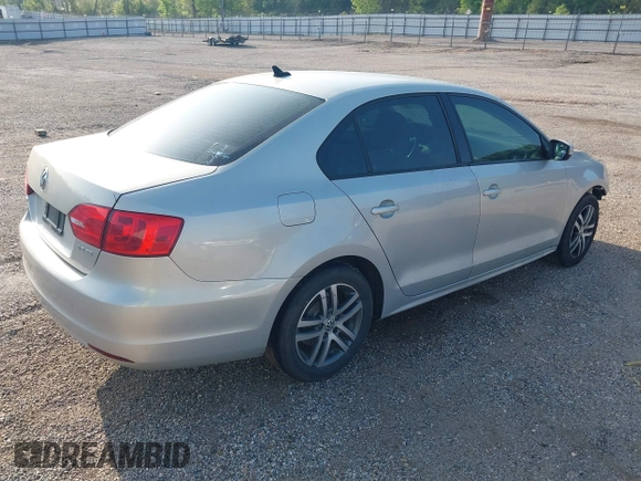 2011 Volkswagen Jetta Sedan SE w/Convenience & Sunroof with VIN 3VWDX7AJ5BM322367, listed as a IAAI auction lot 41845769 with 147,262 mi miles. Bid and sale history available at carsss.com. Image 4.