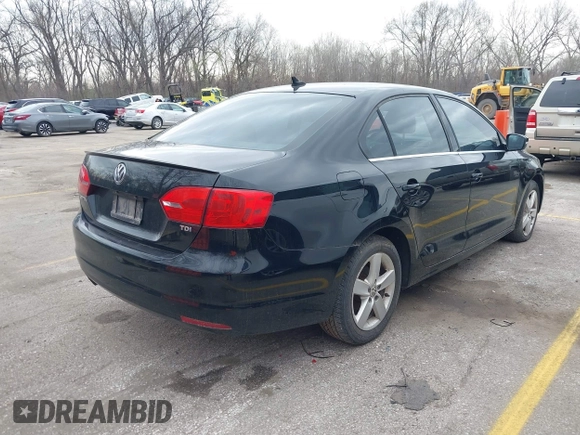 2012 Volkswagen Jetta TDI w/Premium with VIN 3VWLL7AJ9CM367840, listed as a IAAI auction lot 41868444 with 176,486 mi miles and . Bid and sale history available at DreamBid. Image 4.