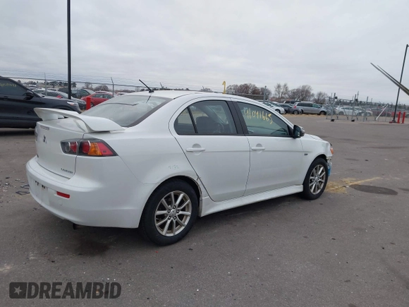 2016 Mitsubishi Lancer SE with VIN JA32V2FWXGU003619, listed as a IAAI auction lot 41041665 with 98,627 mi miles. Bid and sale history available at carsss.com. Image 4.