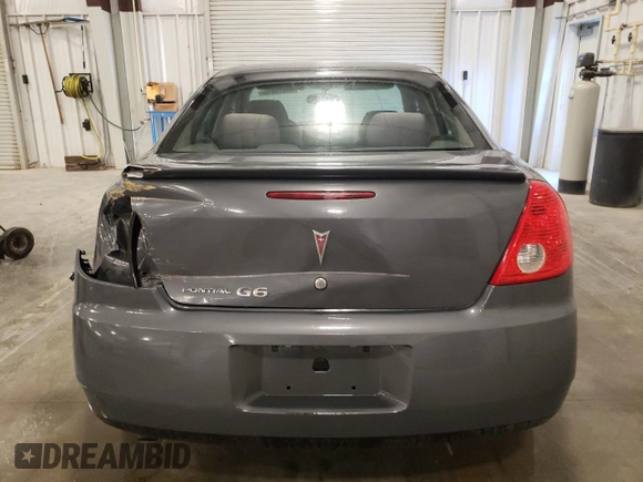 2008 Pontiac G6 z VIN 1G2ZG57B084103452, wystawiony jako Copart lot #59618015 z przebiegiem 143 058 mil mil oraz Szkoda całkowita • Salvage title. Historia ofert i sprzedaży dostępna na DreamBid. Obrazek 6.