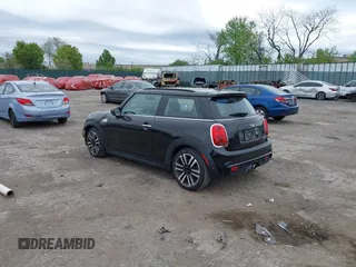 2020 MINI Hardtop Cooper S z VIN WMWXR5C00L2L44737, wystawiony jako IAAI lot #42091511 z przebiegiem 24 356 mil mil oraz . Historia ofert i sprzedaży dostępna na DreamBid. Obrazek 3.