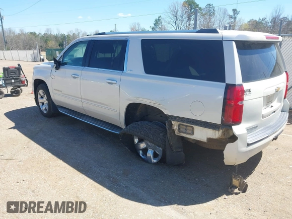 2015 Chevrolet Suburban LTZ with VIN 1GNSCKKC3FR113388, listed as a IAAI auction lot 41867964 with 238,530 mi miles and . Bid and sale history available at DreamBid. Image 3.