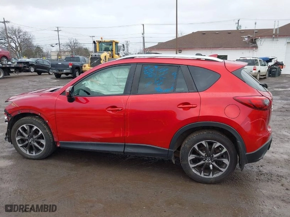 2016 Mazda CX-5 Grand Touring with VIN JM3KE4DYXG0668830, listed as a IAAI auction lot 41738187 with NaN miles. Bid and sale history available at carsss.com. Image 14.