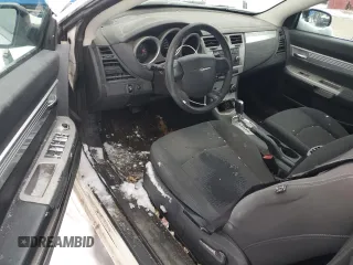 2010 Chrysler Sebring Touring with VIN 1C3BC5EDXAN219324, listed as a Copart auction lot 86085084 with 147,209 mi miles and Salvage Title. Bid and sale history available at carsss.com. Image 8.
