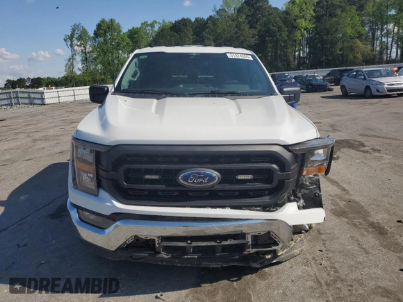 2023 Ford F-150 XL with VIN 1FTFW1ED8PFD25707, listed as a Copart auction lot 51474555 with 16,073 mi miles and Salvage title. Bid and sale history available at DreamBid. Image 5.