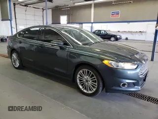 2015 Ford Fusion SE z VIN 3FA6P0H98FR295646, wystawiony jako Copart lot #57055105 z przebiegiem 121 515 mil mil oraz Szkoda całkowita • Salvage title. Historia ofert i sprzedaży dostępna na DreamBid. Obrazek 4.