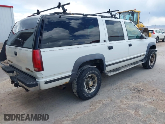 1994 GMC Suburban z VIN 1GKGK26N6RJ771534, wystawiony jako IAAI lot #42359227 z przebiegiem 257 865 mil mil oraz . Historia ofert i sprzedaży dostępna na DreamBid. Obrazek 4.