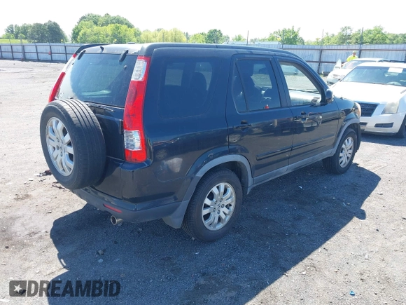 2005 Honda CR-V EX SE with VIN JHLRD789X5C059816, listed as a IAAI auction lot 42016042 with 171,276 mi miles. Bid and sale history available at carsss.com. Image 4.