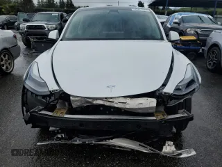 2022 Tesla Model Y Performance with VIN 7SAYGDEF3NF390848, listed as a Copart auction lot 49441025 with 42,488 mi miles and Salvage Title. Bid and sale history available at DreamBid. Image 5.