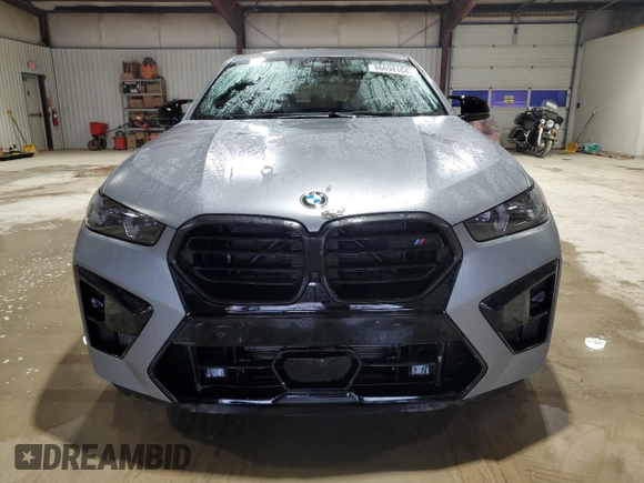 2024 BMW X6 M with VIN 5YM23ET0XR9U26576, listed as a Copart auction lot 86698164 with 6,669 mi miles and Salvage Title. Bid and sale history available at carsss.com. Image 5.