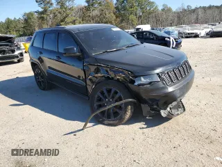 2018 Jeep Grand Cherokee Altitude with VIN 1C4RJFAGXJC388535, listed as a Copart auction lot 89369595 with 127,531 mi miles and Salvage title. Bid and sale history available at DreamBid. Image 4.