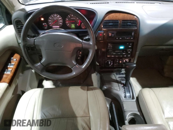 2000 Infiniti QX4 z VIN JNRAR07Y6YW080306, wystawiony jako Copart lot #85022064 z przebiegiem 278 383 mil mil oraz Tytuł czysty. Historia ofert i sprzedaży dostępna na DreamBid. Obrazek 8.