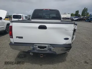 2002 Ford F-150 XL with VIN 1FTRX18L62KC53807, listed as a Copart auction lot 57463075 with 173,301 mi miles and Salvage title. Bid and sale history available at DreamBid. Image 6.