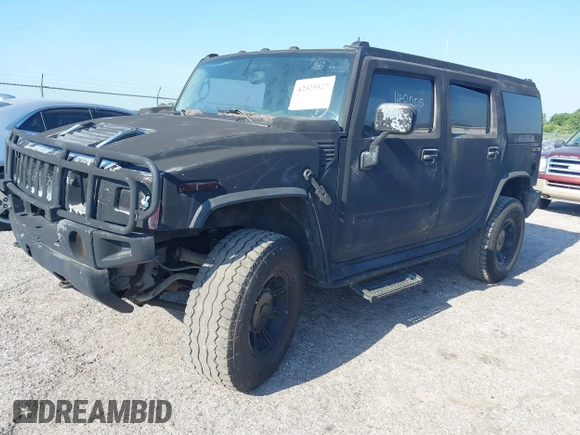 2003 Hummer H2 z VIN 5GRGN23UX3H140510, wystawiony jako IAAI lot #42325527 z przebiegiem 140 010 mil mil oraz . Historia ofert i sprzedaży dostępna na DreamBid. Obrazek 18.