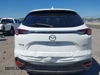 2020 Mazda CX-9 Touring with VIN JM3TCACY6L0403584, listed as a IAAI auction lot 41784589 with 55,328 mi miles and . Bid and sale history available at DreamBid. Image 6.