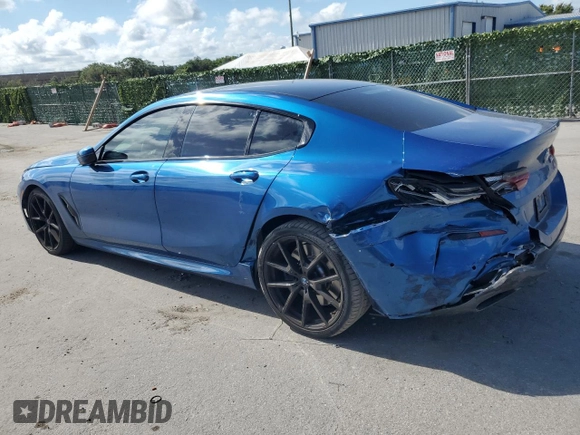2020 BMW 8 Series 840i with VIN WBAGV2C01LCD29736, listed as a Copart auction lot 57632994 with 36,157 mi miles and Salvage Title. Bid and sale history available at DreamBid. Image 2.