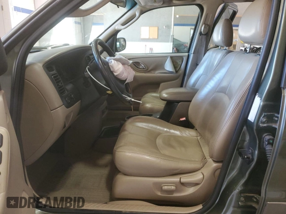 2002 Mazda Tribute LX with VIN 4F2YU09142KM39082, listed as a Copart auction lot 49973375 with 128,002 mi miles and Clean Title. Bid and sale history available at carsss.com. Image 7.