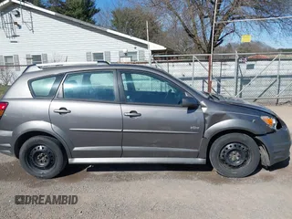2007 Pontiac Vibe with VIN 5Y2SL65857Z433353, listed as a IAAI auction lot 41829714 with 256,547 mi miles. Bid and sale history available at carsss.com. Image 13.