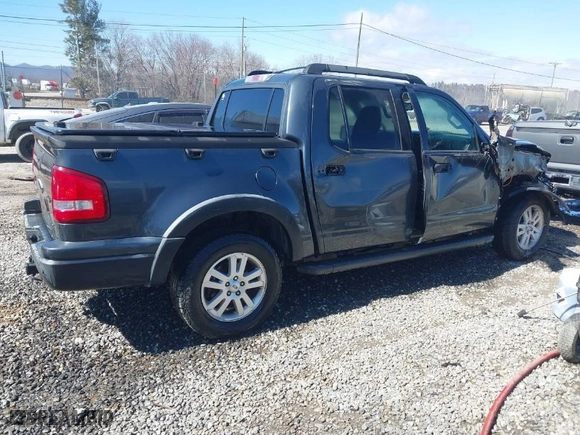 2010 Ford Explorer Sport Trac XLT with VIN 1FMEU5BE5AUF07305, listed as a IAAI auction lot 41631185 with 240,290 mi miles. Bid and sale history available at carsss.com. Image 4.