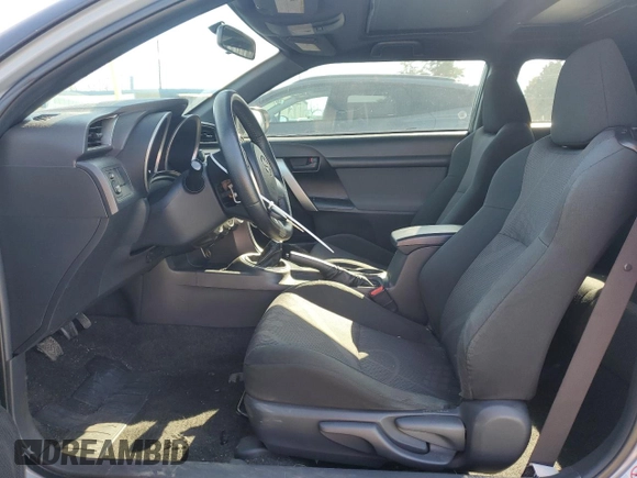 2012 Scion tC z VIN JTKJF5C78C3040542, wystawiony jako Copart lot #43595925 z przebiegiem 160 106 mil mil oraz Szkoda całkowita • Salvage title. Historia ofert i sprzedaży dostępna na DreamBid. Obrazek 7.