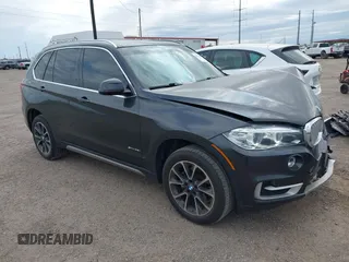 2018 BMW X5 sDrive35i z VIN 5UXKR2C5XJ0X10198, wystawiony jako IAAI lot #41933487 z przebiegiem 68 095 mil mil oraz . Historia ofert i sprzedaży dostępna na DreamBid. Obrazek 1.