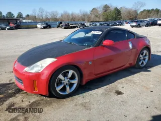 2006 Nissan 350Z with VIN JN1AZ34D76M310742, listed as a Copart auction lot 87121464 with 73,753 mi miles and Salvage title. Bid and sale history available at DreamBid. Image 1.