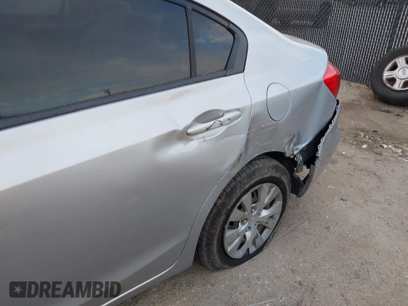 2012 Honda Civic LX z VIN 19XFB2F50CE009909, wystawiony jako IAAI lot #41049186 z przebiegiem 177 356 mil mil oraz . Historia ofert i sprzedaży dostępna na DreamBid. Obrazek 6.