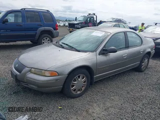 1998 Chrysler Cirrus LXi z VIN 1C3EJ56H0WN300229, wystawiony jako IAAI lot #42251263 z przebiegiem 191 491 mil mil oraz . Historia ofert i sprzedaży dostępna na DreamBid. Obrazek 2.