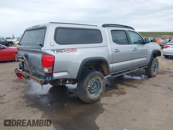 2017 Toyota Tacoma SR5 with VIN 3TMCZ5AN8HM051829, listed as a IAAI auction lot 41616329 with 64,113 mi miles and . Bid and sale history available at DreamBid. Image 4.