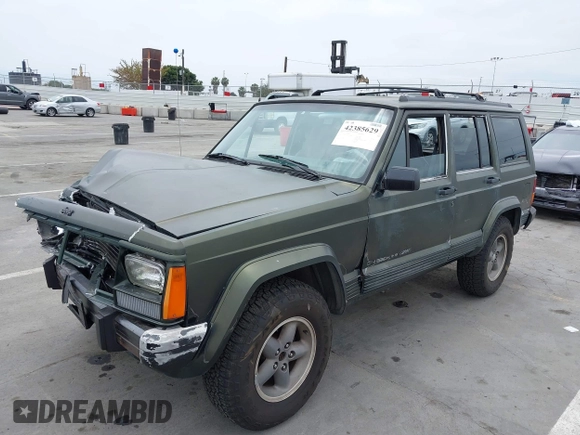 1996 Jeep Cherokee Sport z VIN 1J4FT68S6TL267408, wystawiony jako IAAI lot #42385629 z przebiegiem 268 753 mil mil oraz . Historia ofert i sprzedaży dostępna na DreamBid. Obrazek 18.