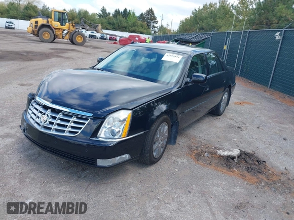 2009 Cadillac DTS 1SC z VIN 1G6KD57Y29U141800, wystawiony jako IAAI lot #42190874 z przebiegiem 115 043 mil mil oraz . Historia ofert i sprzedaży dostępna na DreamBid. Obrazek 17.