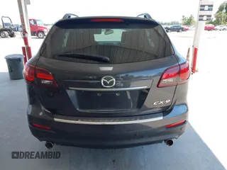 2014 Mazda CX-9 Grand Touring z VIN JM3TB2DA0E0434181, wystawiony jako IAAI lot #42295436 z przebiegiem 78 372 mil mil oraz . Historia ofert i sprzedaży dostępna na DreamBid. Obrazek 16.