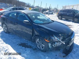 2017 Honda Civic LX z VIN 19XFC2F5XHE033865, wystawiony jako IAAI lot #41634110 z przebiegiem 83 523 mil mil oraz . Historia ofert i sprzedaży dostępna na DreamBid. Obrazek 1.