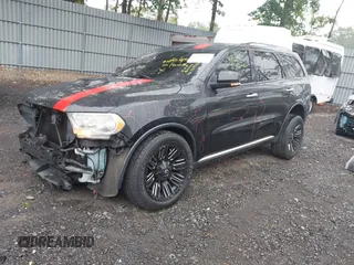 2013 Dodge Durango Crew with VIN 1C4RDJDG8DC675527, listed as a IAAI auction lot 42452197 with 184,981 mi miles and . Bid and sale history available at DreamBid. Image 17.