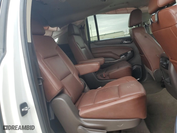 2017 Chevrolet Suburban Premier with VIN 1GNSCJKC3HR380897, listed as a Copart auction lot 79512474 with 121,928 mi miles and Salvage Title. Bid and sale history available at carsss.com. Image 11.