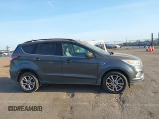 2017 Ford Escape SE with VIN 1FMCU0GD1HUE75697, listed as a IAAI auction lot 42077385 with 160,634 mi miles and . Bid and sale history available at DreamBid. Image 13.