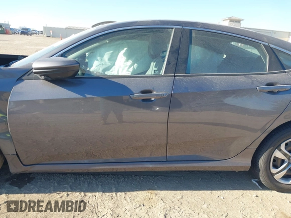 2016 Honda Civic Sedan LX with VIN 2HGFC2F55GH546980, listed as a IAAI auction lot 41378567 with 145,091 mi miles. Bid and sale history available at carsss.com. Image 14.