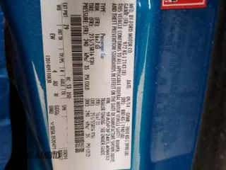 2014 Ford Focus SE with VIN 1FADP3F24EL406933, listed as a Copart auction lot 47826345 with 115,310 mi miles and Salvage Title. Bid and sale history available at carsss.com. Image 14.