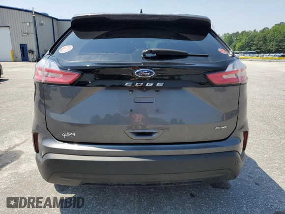 2021 Ford Edge SE with VIN 2FMPK4G99MBA58726, listed as a Copart auction lot 56795185 with 80,360 mi miles and Salvage title. Bid and sale history available at DreamBid. Image 6.